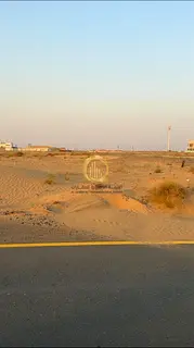 Commercial/residential land for sale in Rawdat Al Qurt area, Sharjah. Area: 8073 sq ft.