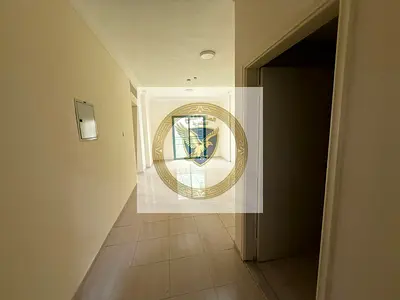 Annual apartment for rent in Al Qasimia – Second tenant, spacious layout, open view, free maintenance, central AC, and a prime location close