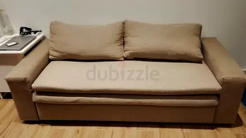 Beige 2-Seater Sofa Bed in Good Condition