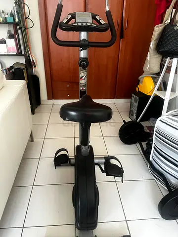 Upright Manual Exercise Bike with Adjustable Seat and Console - Good Condition