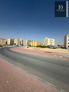 Prime commercial/residential land for sale in the Muwaileh commercial district, the ideal choice for