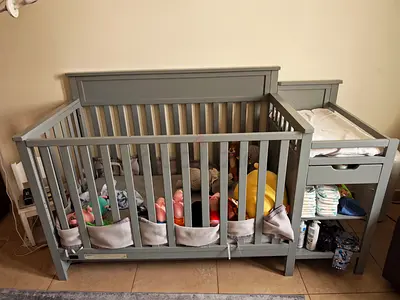 Baby crib with changing table and mattress