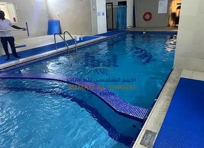 Special Deal|| Spacious 2 BR || Parking Free|| Family Building || Gym And Pool|| On Dubai Border ||