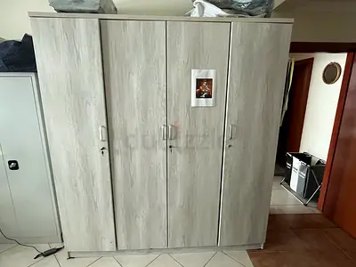 Light wood 4 door wardrobe with shelves and hanging space - good condition
