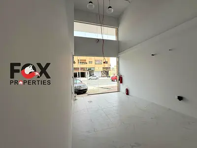 Shop for annual rent in Al Muwaihat 3, Ajman, on a main street, with an area of ​​900 feet, suitable for commercial activities.