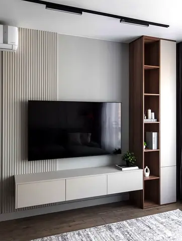 Modern wall-mounted TV unit with tall shelving and floating cabinet