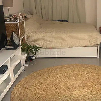 Round natural jute woven rug - good condition