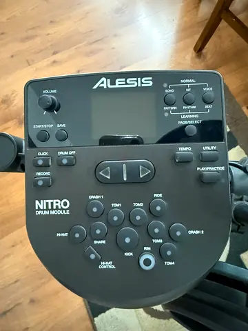 Alesis Nitro Mesh Drum Kit with sticks and music reading stand
