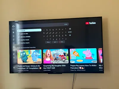 Sony 55 Smart LED TV mounted on wall — good working condition
