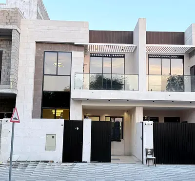 For sale in Al Yasmin: Townhouse with 4 bedrooms, living room, and sitting room.