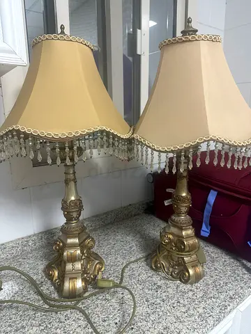 Pair of vintage brass table lamps with fringed shades