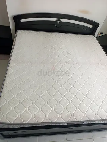 Queen bed frame with mattress - sturdy black wooden frame