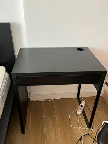 Simple black study desk with cable hole - good condition