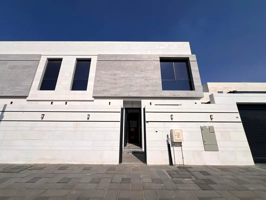 Modern Villa for Sale in Al Hoshi | Luxury Design with Private Garden