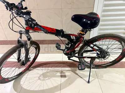 Used full-size mountain bike - dual suspension, good condition,Foldabe