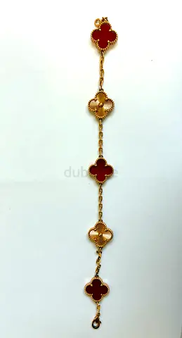 Clover Motif Bracelet with Red and Gold Tone Charms