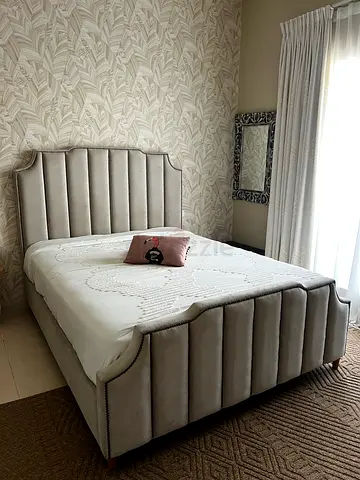 King-size upholstered bed frame with padded headboard and footboard - neutral grey