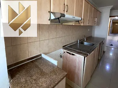 Studio in Muwaileh separate kitchen and room central gas AC free maintenance near schools and bus station up to 6 payments