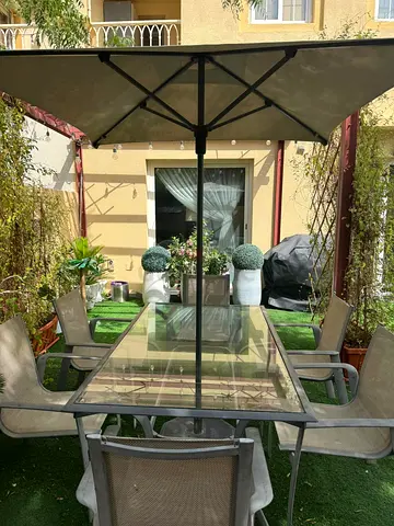 6-Seater Outdoor Dining Set with Glass Table and Canopy Umbrella