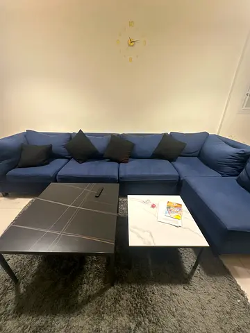 Blue L-shaped Corner Sofa with Cushions - Good Condition