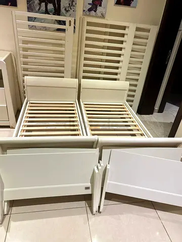 Baby crib into folder bed Ikea white wooden bed good condition