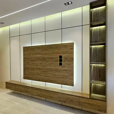 Custom wall-mounted TV entertainment unit with LED backlight and shelving