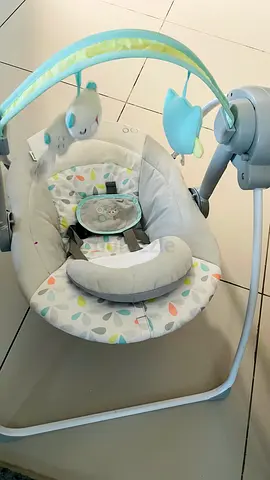Gently used electric baby rocker/soothing swing with toy bar