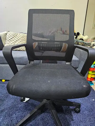 Used Black Mesh Office Chair with Armrests - Good Working Condition
