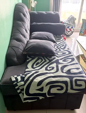 L-shaped tufted fabric sofa - dark grey, good condition