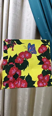 Hand-painted floral canvas with butterfly size 8×8 cm.... acrylic medium.