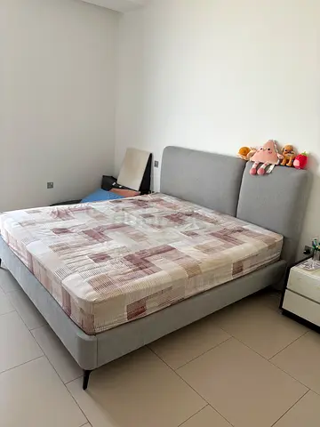 Grey fabric king size double bed with mattress - good condition. From Homecentre. Used for 1 year