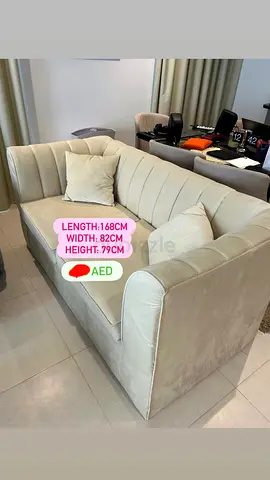 Light beige 2-seater sofa - 168cm length, good condition