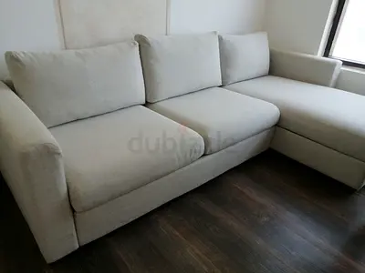 Beige L-shaped 3-seater sofa with chaise - good condition