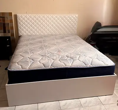 Bed with memory foam mattress