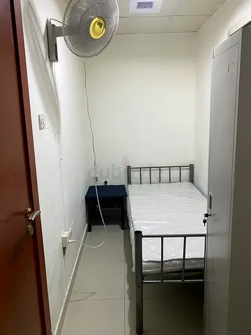 Small room with attached bathroom