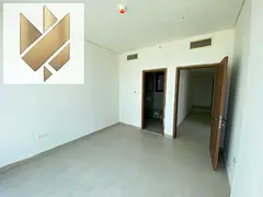 Two-bedroom apartment with a living room in Al Zahia, with parking and free swimming pool access.