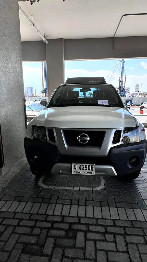 Nissan Xterra 2014 — photo 1 of 10