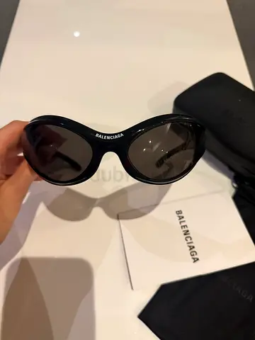 Balenciaga black oval sunglasses with case and pouch