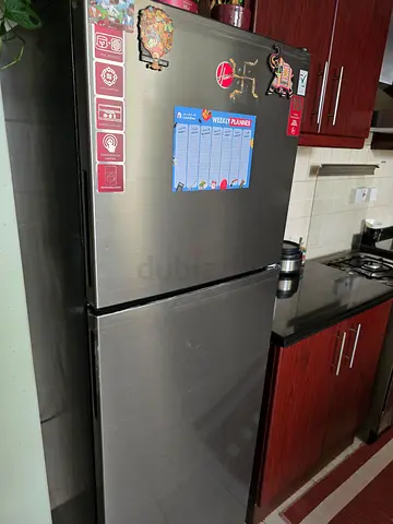Stainless Steel Double-Door Refrigerator - Good Condition