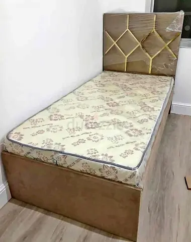Single bed with mattress and upholstered headboard - good condition