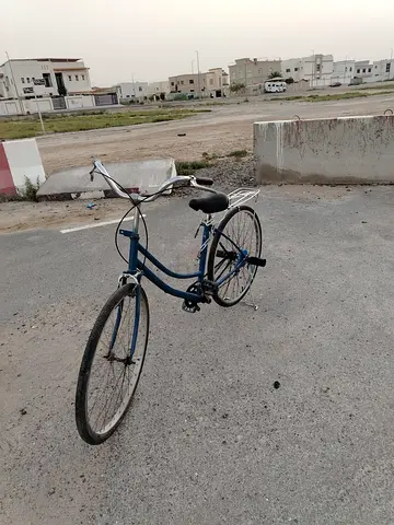 Used blue city/commuter bicycle with rear carrier - good working condition