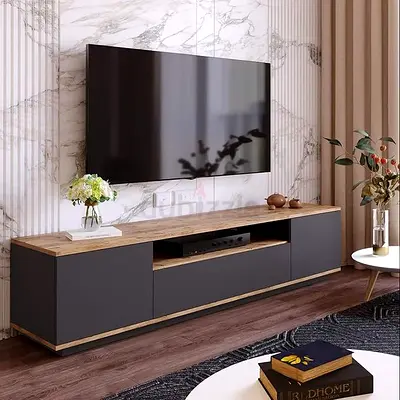 Modern low-profile TV cabinet with matte grey doors and wood top