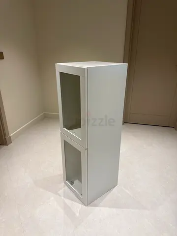 Brand new Slim white display cabinet with glass doors