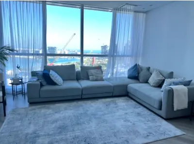 Light grey L-shaped sofa  - good condition