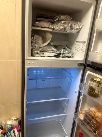 Compact refrigerator with top freezer - used, good condition