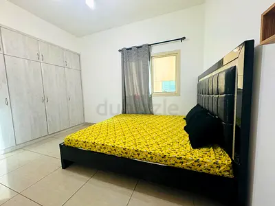 Big sized Clean and Cozy bedroom with attached bathroom