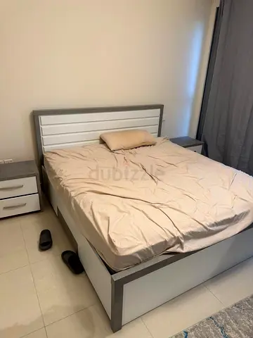 Queen bed frame with headboard and matching bedside tables - good condition with good mattress