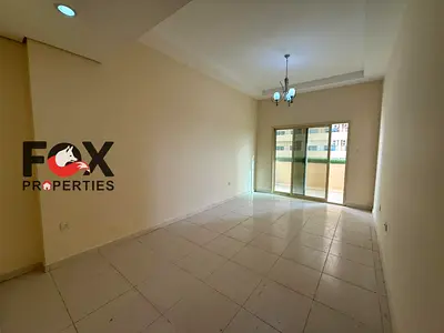 Cheapest room and hall in Ajman for annual rent in Emirates City, free parking, balcony with open v