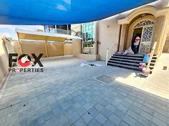 Luxury commercial villa in Al Muwaihat | 2 living rooms + majlis | 5 master bedrooms | Maid's ro