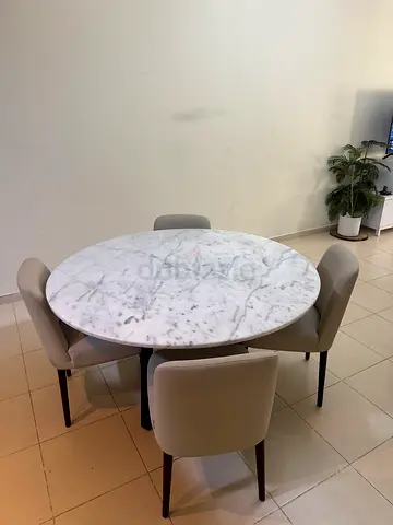 Round White Marble Dining Table with 4 Beige Chairs